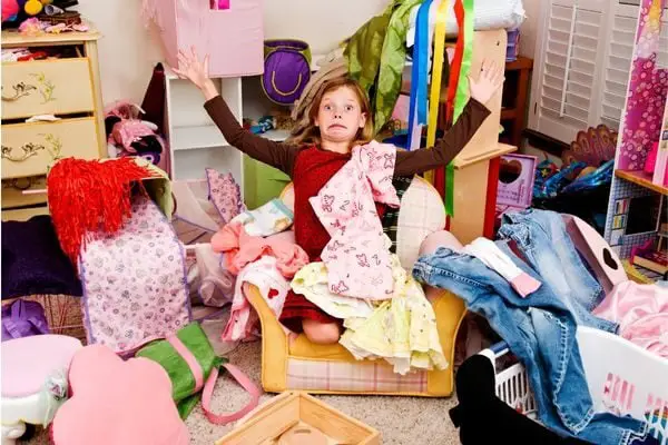 child in messy room