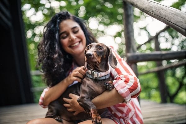 woman with dog; what to do when broke