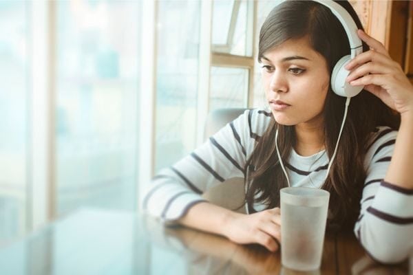 woman wearing headphones; broke things to do for fun