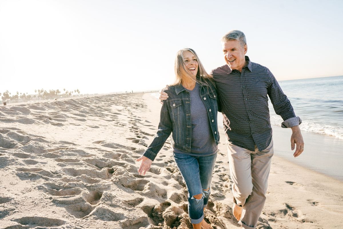 couple walking along the beach