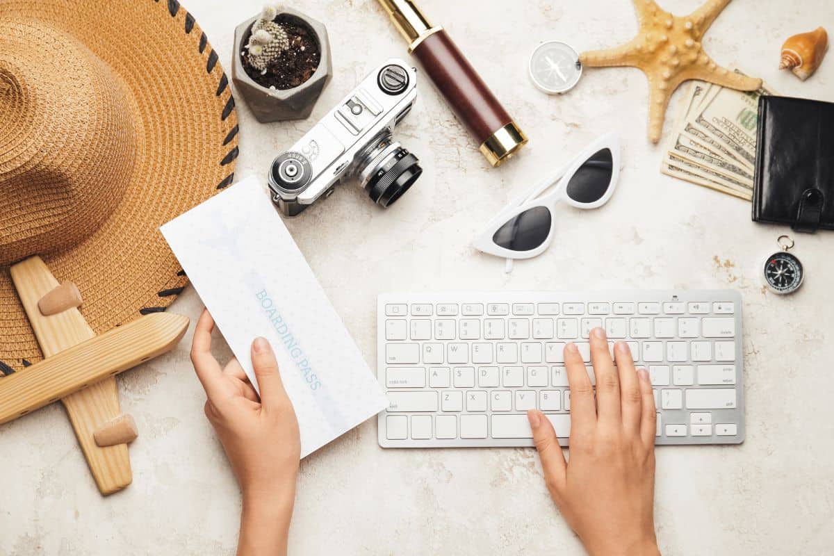 travel agent looking on computer