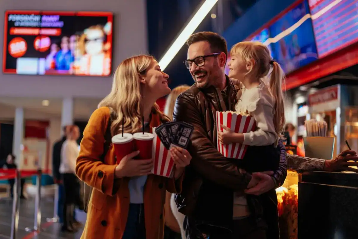 family at the movie theater
