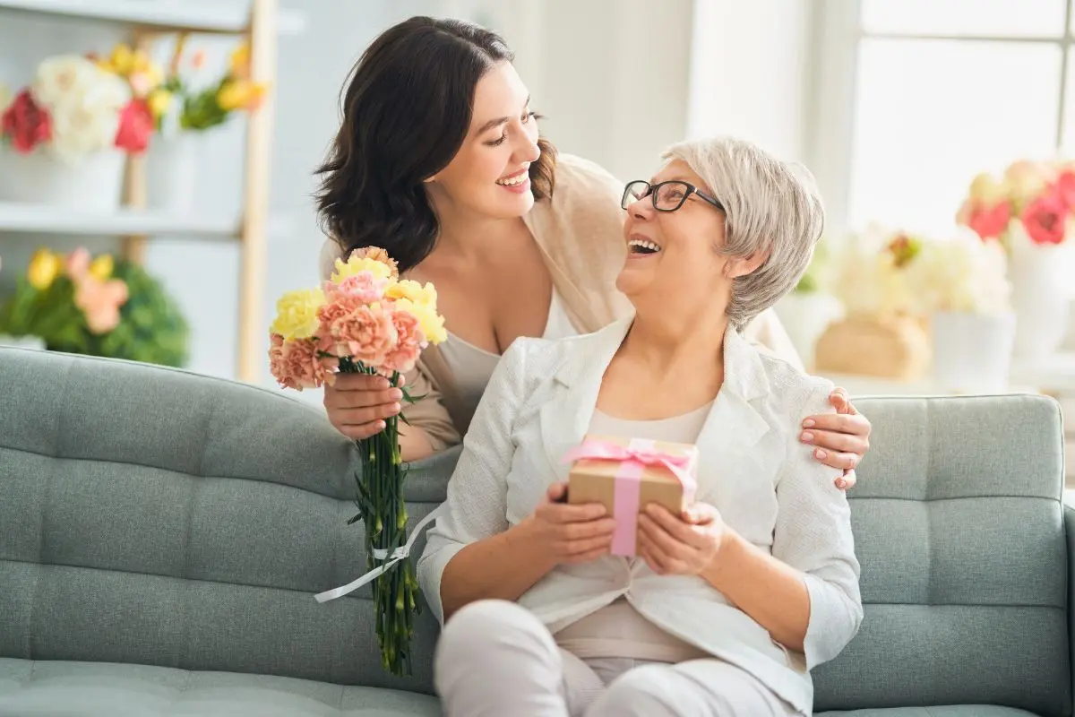woman with her mom sitting on a couch