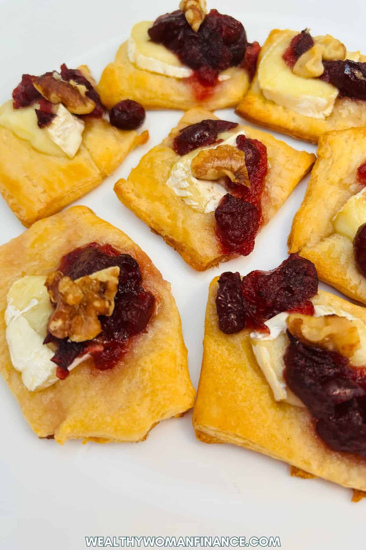 Thanksgiving party food on a budget, brie appetizers with cranberry