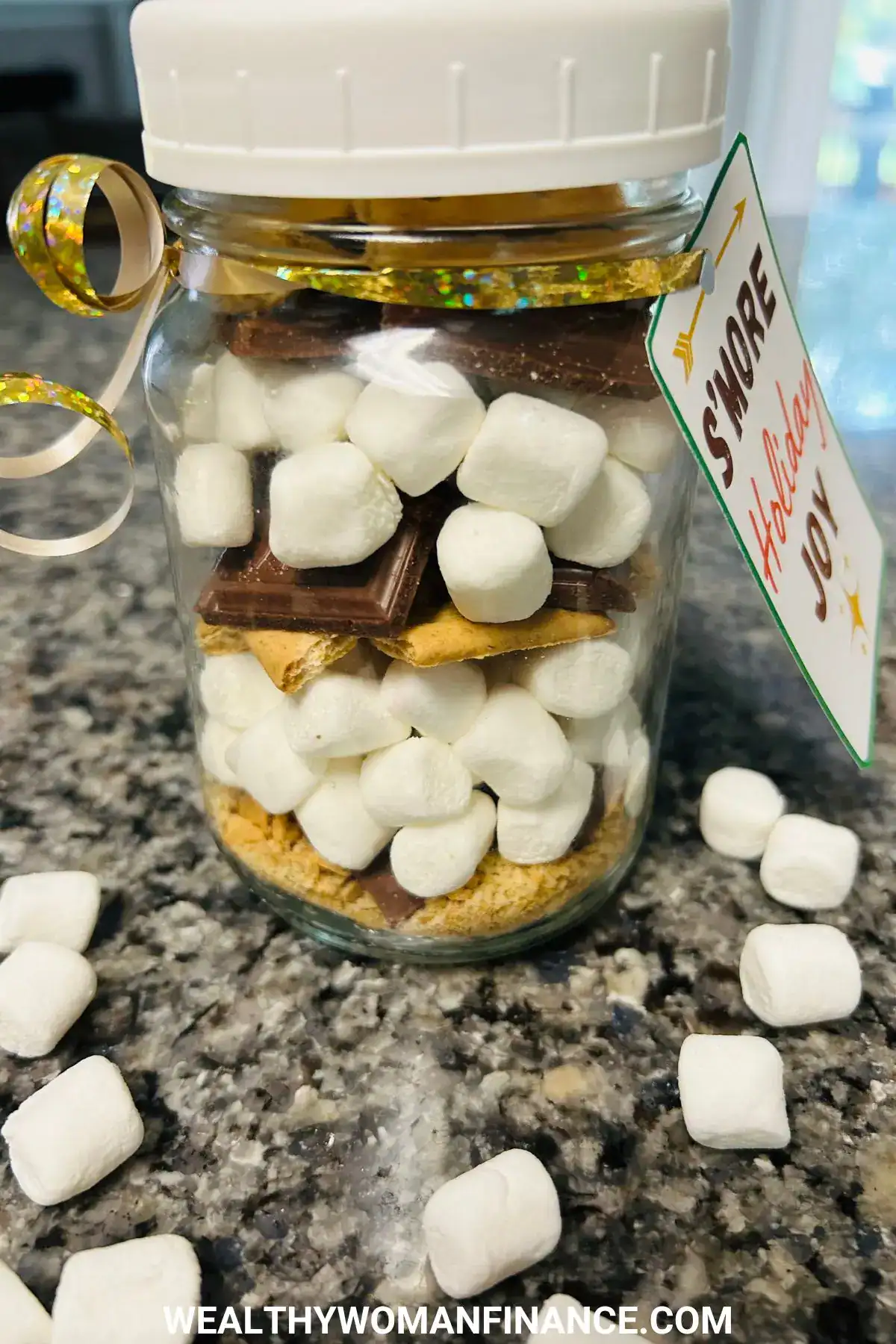 side picture of layering for s'mores in a jar