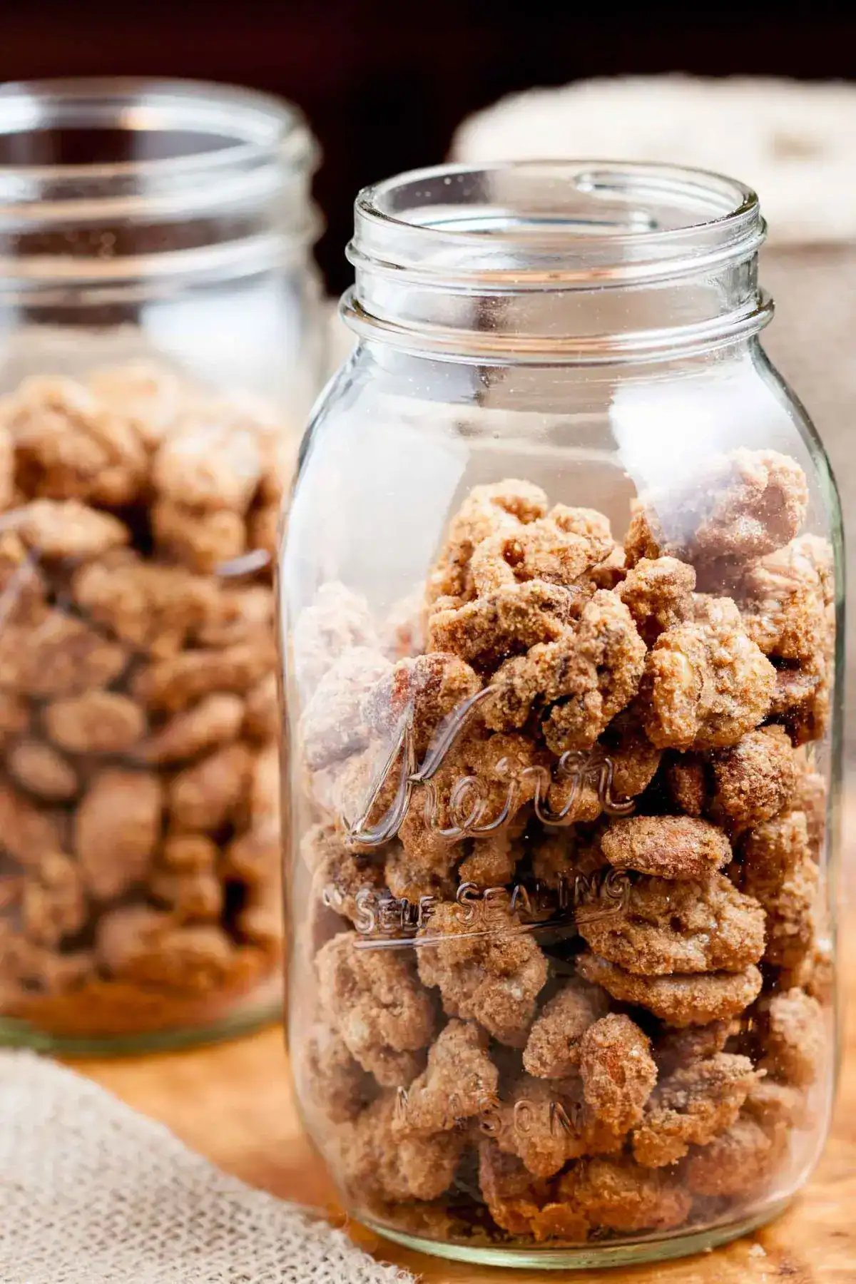 candied pecans in a mason jar