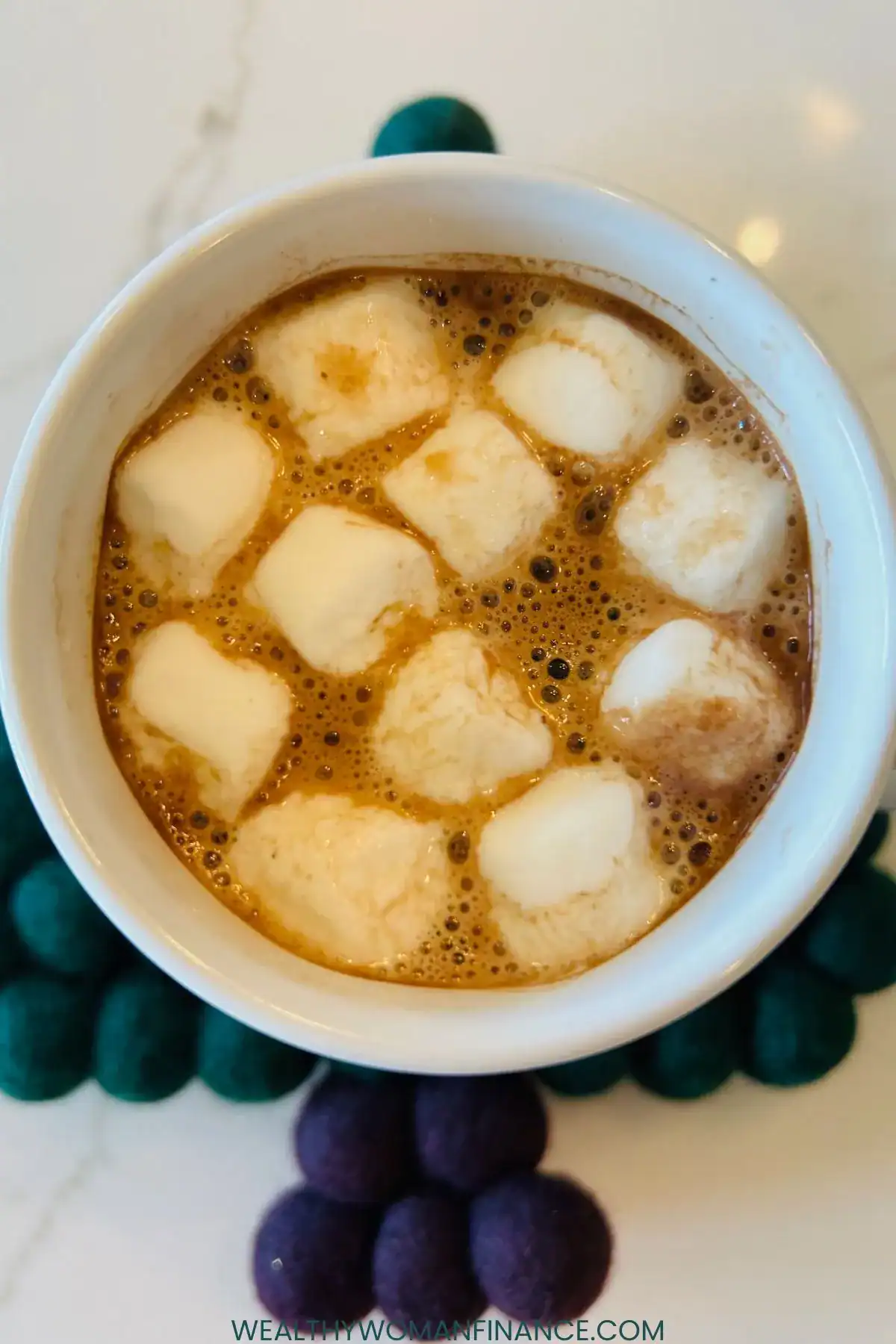 warm chocolate with marshmallows in a mug