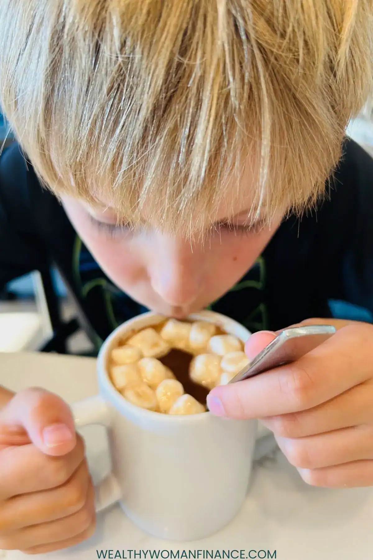 boy drinking hot chocolate