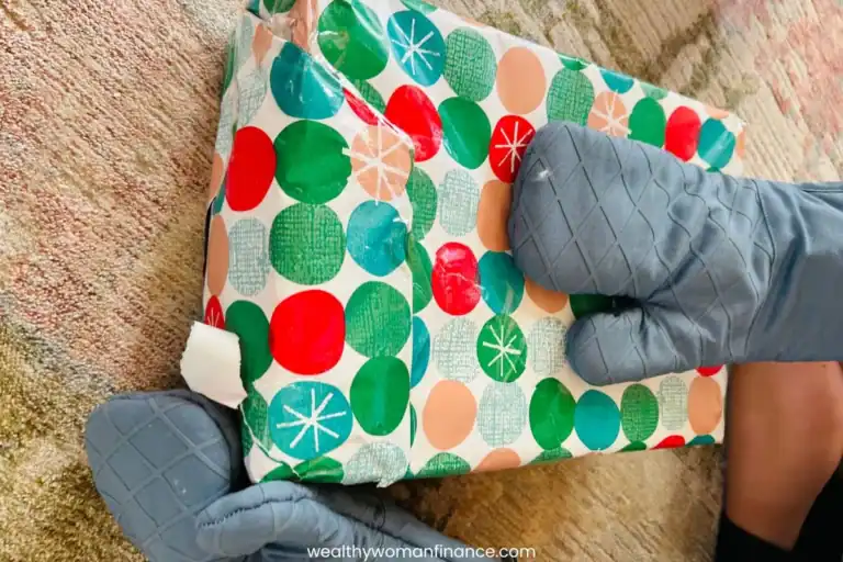 funny Christmas party money game, oven mitts, dice, present